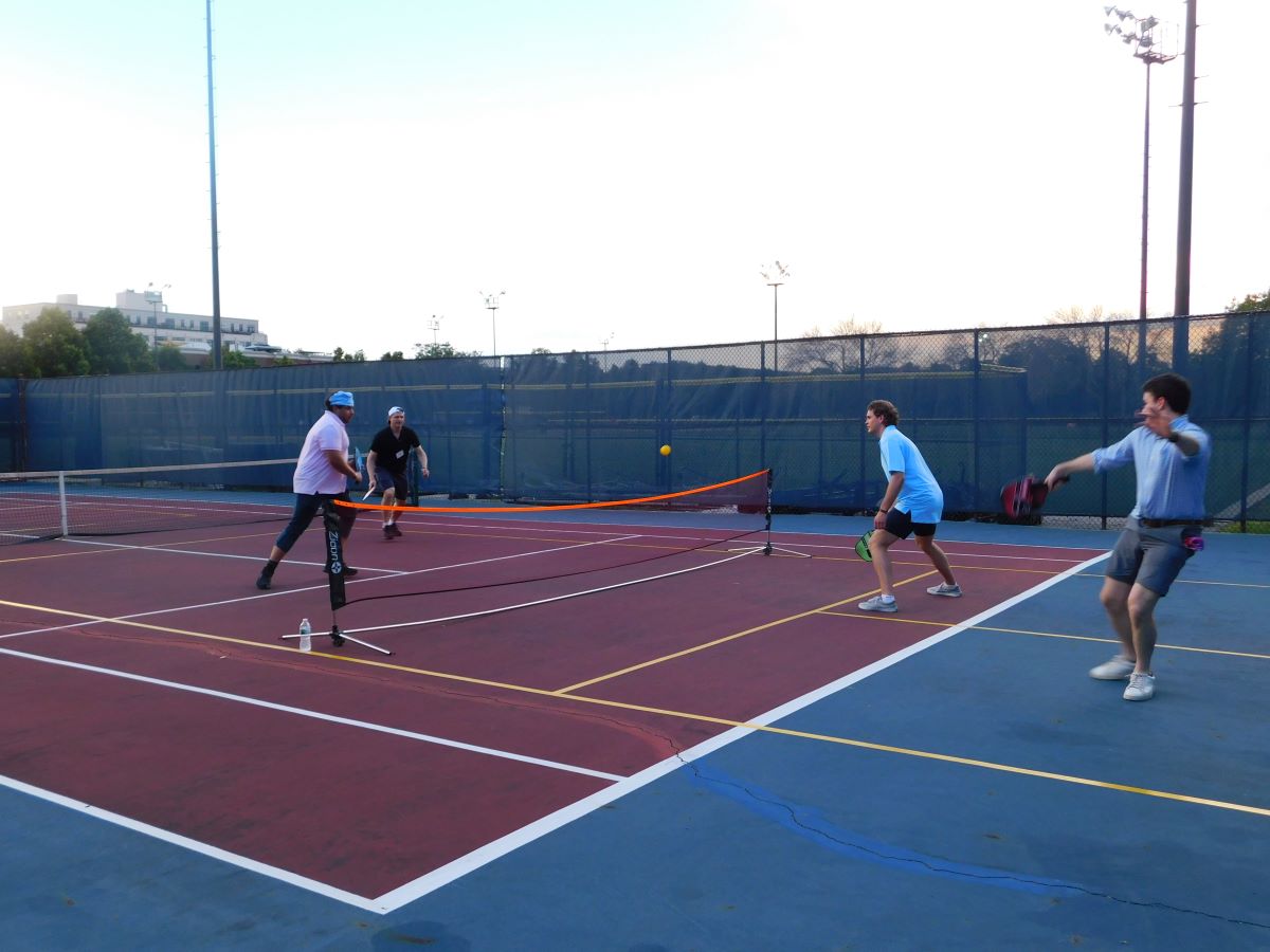 Coworkers Playing Doubles in Pickleball